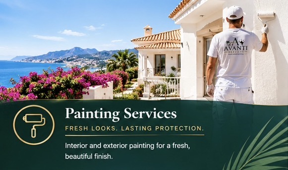 Avanti Services painter applying exterior paint to a white Mediterranean villa above the sea